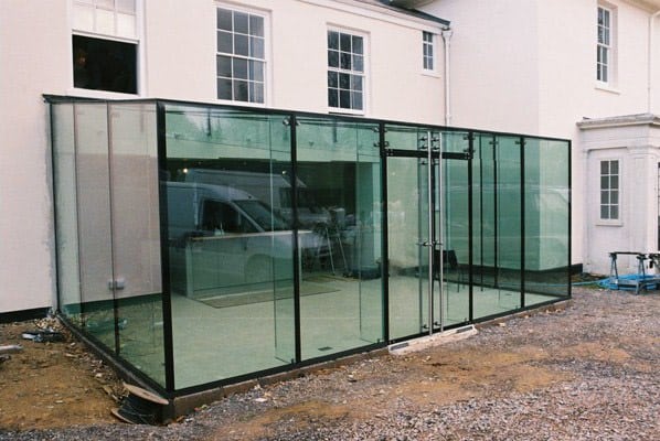 Frameless glass box and ClearGlaze glass doors.