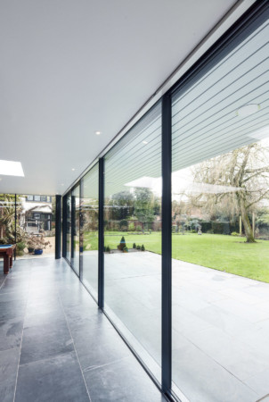 Structural glazing and Sky-frame sliding doors.