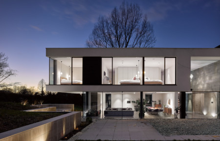 Sky-Frame sliding doors to ground floor with structural glass linked to Millenium windows